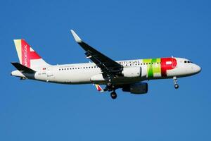 TAP Air Portugal passenger plane at airport. Schedule flight travel. Aviation and aircraft. Air transport. Global international transportation. Fly and flying. photo