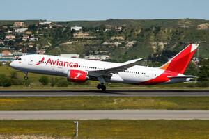 Avianca passenger plane at airport. Schedule flight travel. Aviation and aircraft. Air transport. Global international transportation. Fly and flying. photo