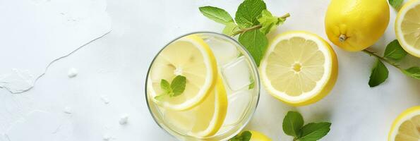 Lemonade in a glass with fresh lemons and mint. Cold summer drink with copy space. Generative AI photo