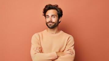 portrait of a handsome man with a beard and a sweater standing against a pink background. generative ai photo