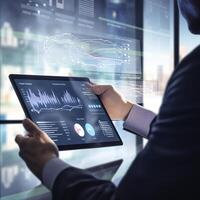 man using tablet with data on screen. photo