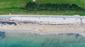 Aerial view on coast of sea at sunset in Helens Bay, Northern Ireland, UK. photo