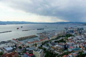 Aerial view of Gibraltar, Algeciras Bay and La Linea de la Concepcion from the Upper Rock. View on coastal city from above photo