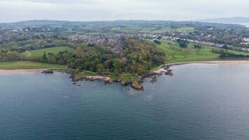 Aerial view on coast of sea at sunset in Helens Bay, Northern Ireland, UK. photo