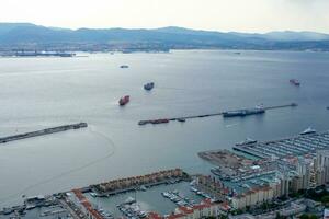 Aerial view of Gibraltar, Algeciras Bay and La Linea de la Concepcion from the Upper Rock. View on coastal city from above photo