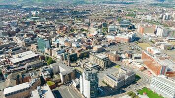 Aerial view on river and buildings in City centre of Belfast Northern Ireland. Drone photo, high angle view of town photo