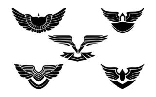 Set of black wings icons. Wings badges. Wings silhouette design elements vector