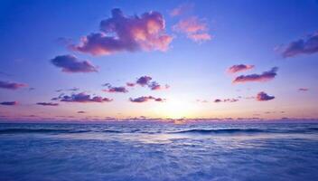 Pink sunset on the beach photo