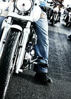 Bikers riding motorbikes photo