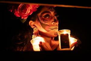 Calavera catrina sentado en un trono. azúcar cráneo constituir. dia Delaware los muertos. día de el muerto. Víspera de Todos los Santos. foto