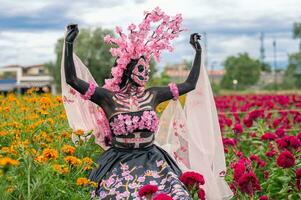 Glorious Elegance in the Heart of Cholula Cempasuchil Fields A Mesmerizing Day of the Dead Photoshoot, Featuring a Stunning Woman Transformed into a Catrina, Paying to the Tradition of die de muertos photo