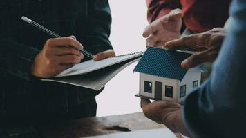 Architects, engineers and homeowners meeting at construction site video