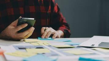 UX graphic designer planning application process development prototype wireframe for web smart phone. Creative digital development agency. in office video