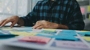 UX graphic designer planning application process development prototype wireframe for web smart phone. Creative digital development agency. in office video