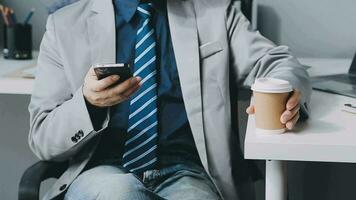 Finance Investment Ideas on Company Growth Project Success Statistics A professional investor working on starting a project for a strategic plan with a document, a laptop, on an office table. video