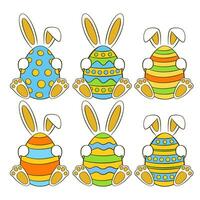 Set of colorful Easter eggs with bunnies vector
