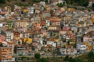 Pastel houses on hillside photo