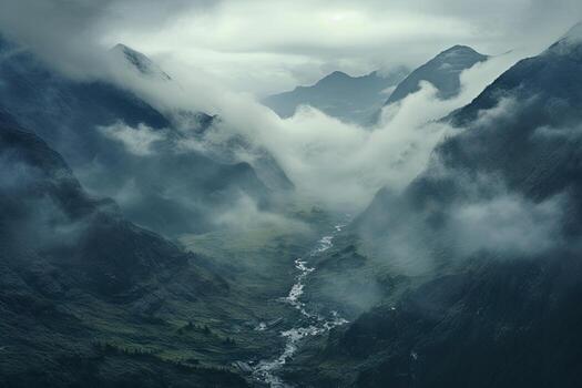 a valley with clouds and mountains photo