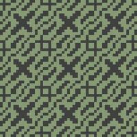 a pixelated pattern in green and black vector