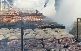 traditional meat grilled on the grill in the Argentine countryside photo