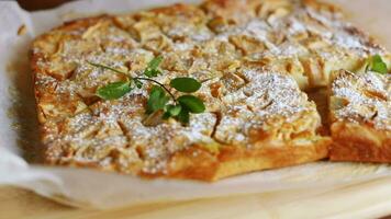 Cooked sweet pie with quince and pumpkin inside, yeast dough roll. video