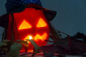 halloween candles and pumpkins in the dark photo