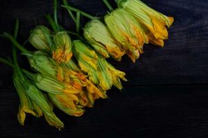 pumpkin flowers on rustic wood photo