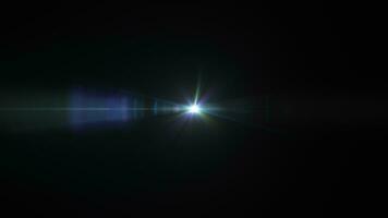 Loop multicolored optical flare light on black abstract background video