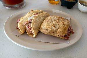 Pork carnitas tacos with handmade tortillas in Mexico photo