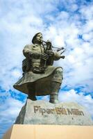 Statue and memorial for Piper Bill Millin. At Sword beach, normandy, France. August 15 2023. photo