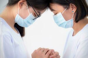 Mother and daughter wear a mask photo