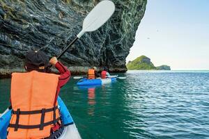 Group of tourists on a kayak photo