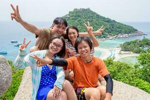 Thai tourists at Koh Nang Yuan island photo