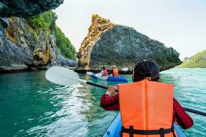 Group of tourists on a kayak photo