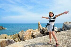 Woman tourist on Hin Ta Hin Yai viewpoint photo