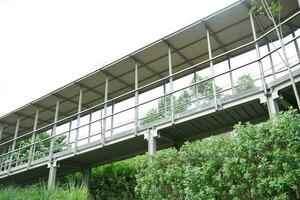 Natural green pedestrian path, from the basement floor to the opposite building in Solo photo