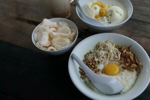 breakfast, snacks in the form of chicken porridge and ice cream photo