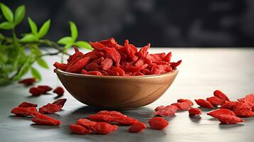 Photo of Goji berry on a minimalist table. Generative AI