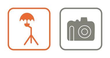 umbrella stand and dslr camera Icon vector