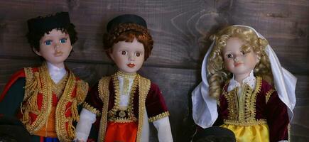 Dolls wearing traditional costumes photo