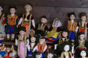 Dolls wearing traditional costumes photo