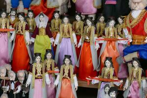 Dolls wearing traditional costumes photo