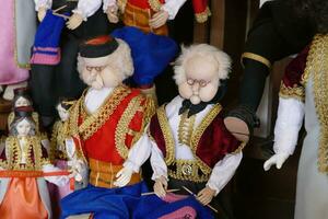 Dolls wearing traditional costumes photo