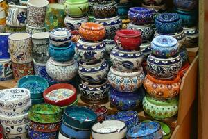 Bright colored enamel bowls in  Grand Bazaar photo