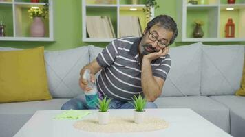 Grumpy old Man cleaning alone. video