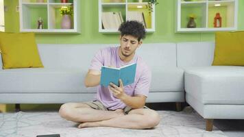 Young man taking notes. video