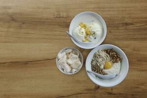 breakfast, snacks in the form of chicken porridge and ice cream photo