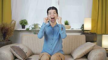 Woman experiencing joy looking at camera. video