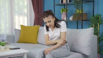 The young woman is suffering from joint pain. video