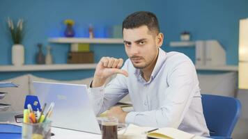 Home office worker man making negative gesture at camera. video
